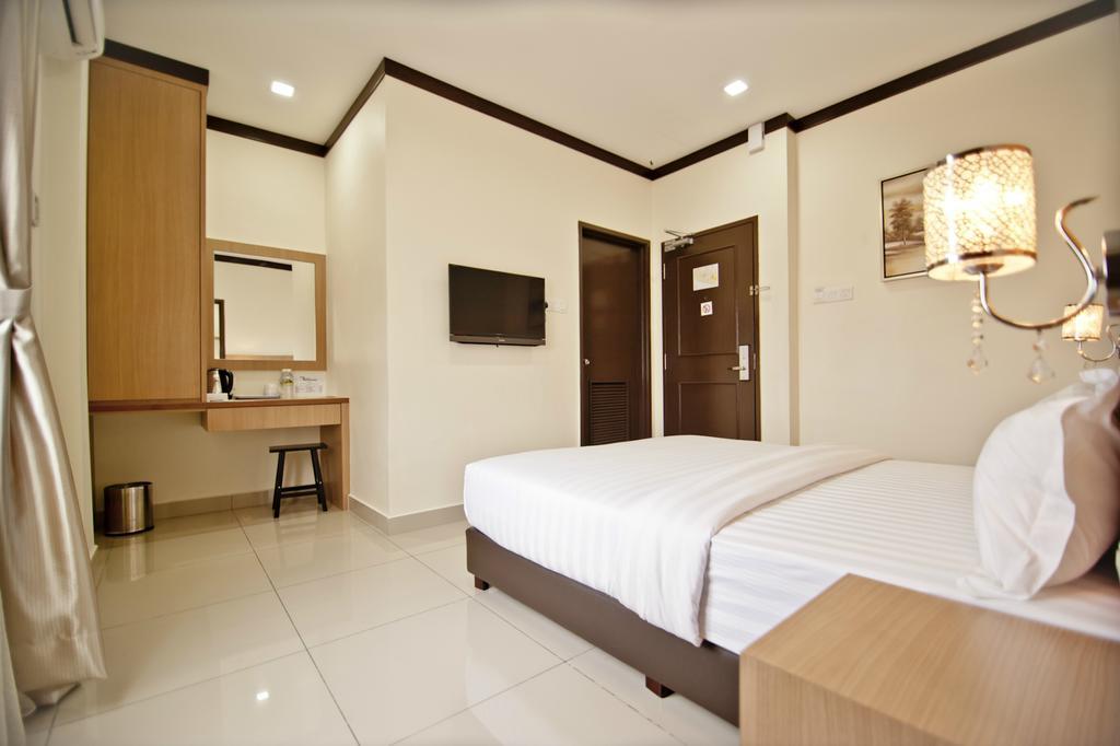 Hotel Setia Keluang Quarto foto