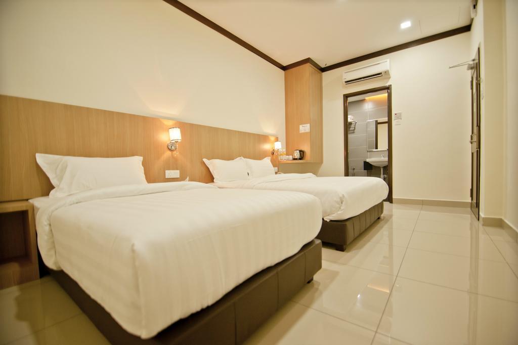 Hotel Setia Keluang Quarto foto