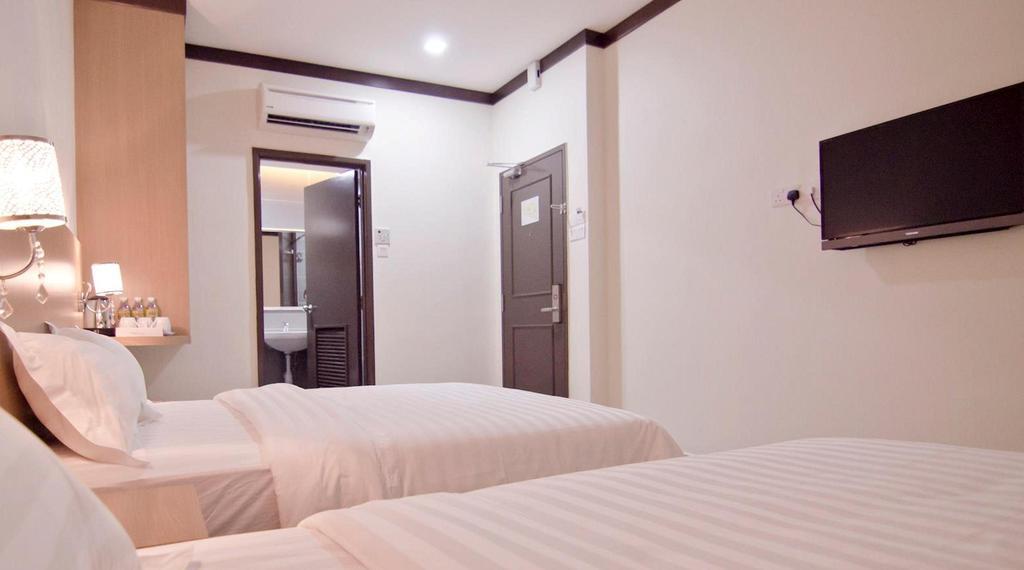Hotel Setia Keluang Quarto foto